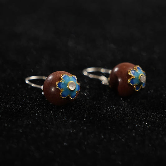 details of scented earrings made by incense