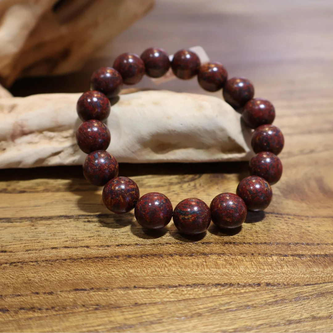 Dream Drift Incense Beads Bracelet on the wooden desk