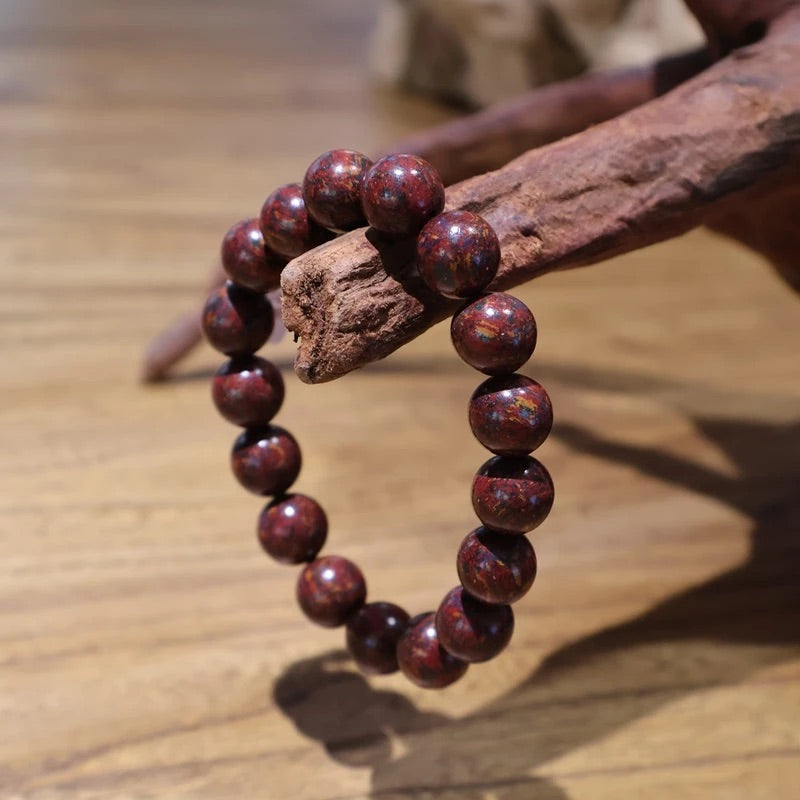 hang Dream Drift Incense Beads Bracelet on the branch for display