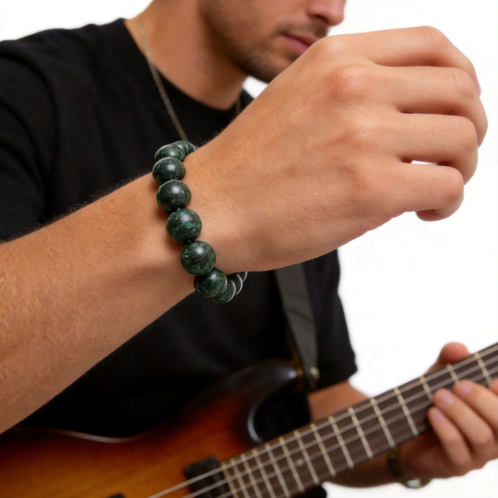 wearable aroma wrist charm for the boy who is playing the guita because the incense bracelet creates a gentle calming fragrance to make him focus on his work